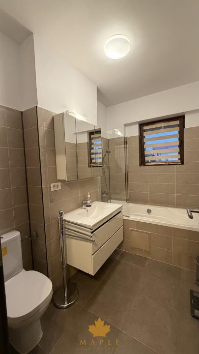 DE INCHIRIAT - Apartament 3 camere, gradina privata, parcare subterana